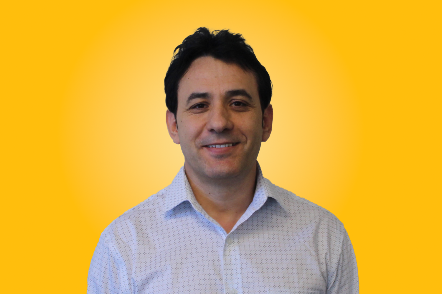 AQ Headshot yellow bg